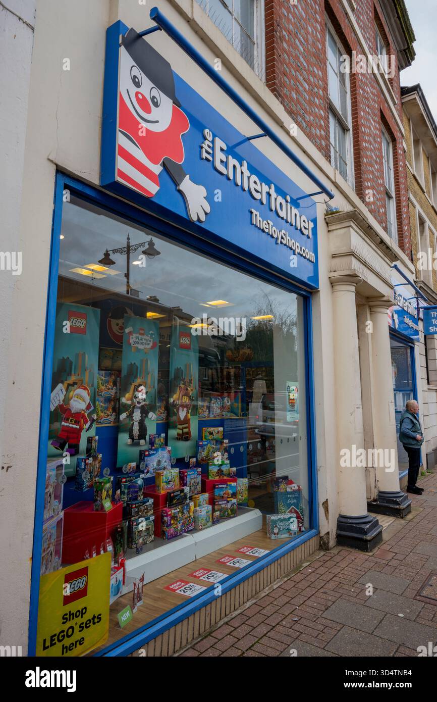 The Entertainer high street toy shop storefront on UK high street with sale banners visible