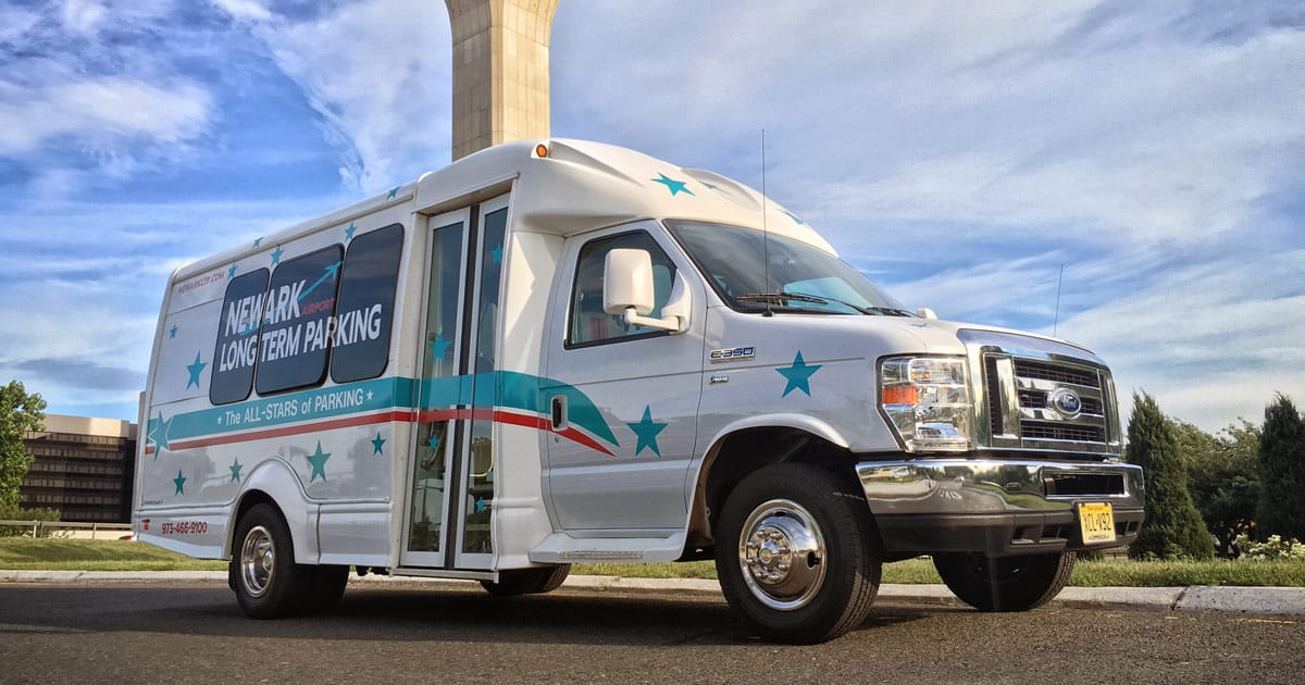 Airport long stay parking shuttle bus service for travelers with luggage at terminal