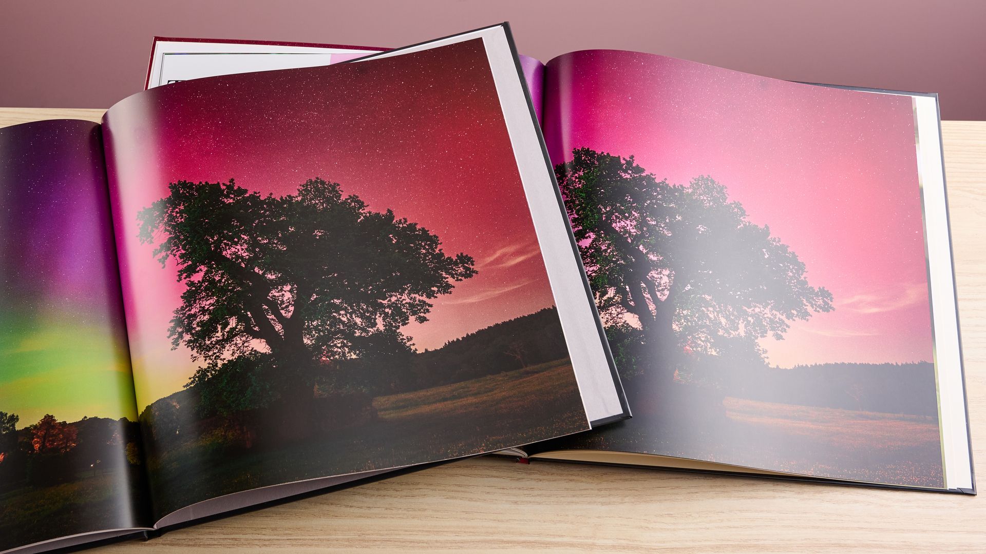 Photobox competitor Cewe photo book showing premium print and paper quality in a business review setting