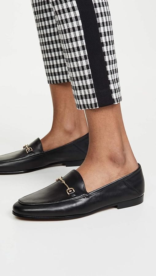 Sam Edelman Loraine loafer in black leather showcasing the classic bit-detail design on a plain background