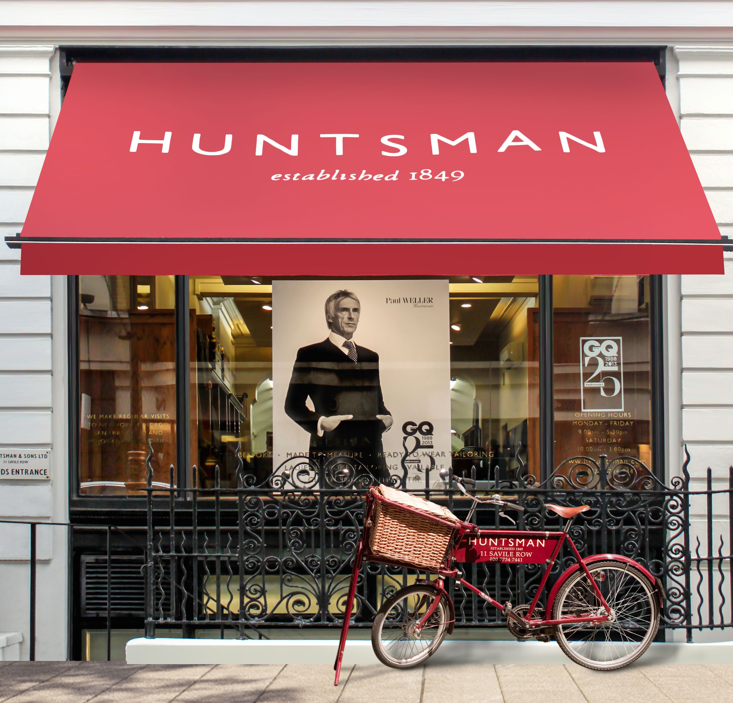 Historic Savile Row London street with heritage bespoke tailoring shopfront and traditional brick facade