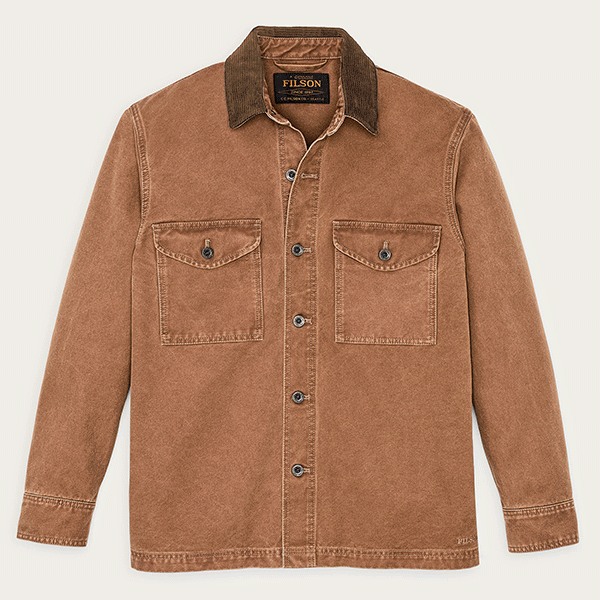 Filson rustic canvas heritage workwear jacket showcasing rugged construction and lifetime durability standards
