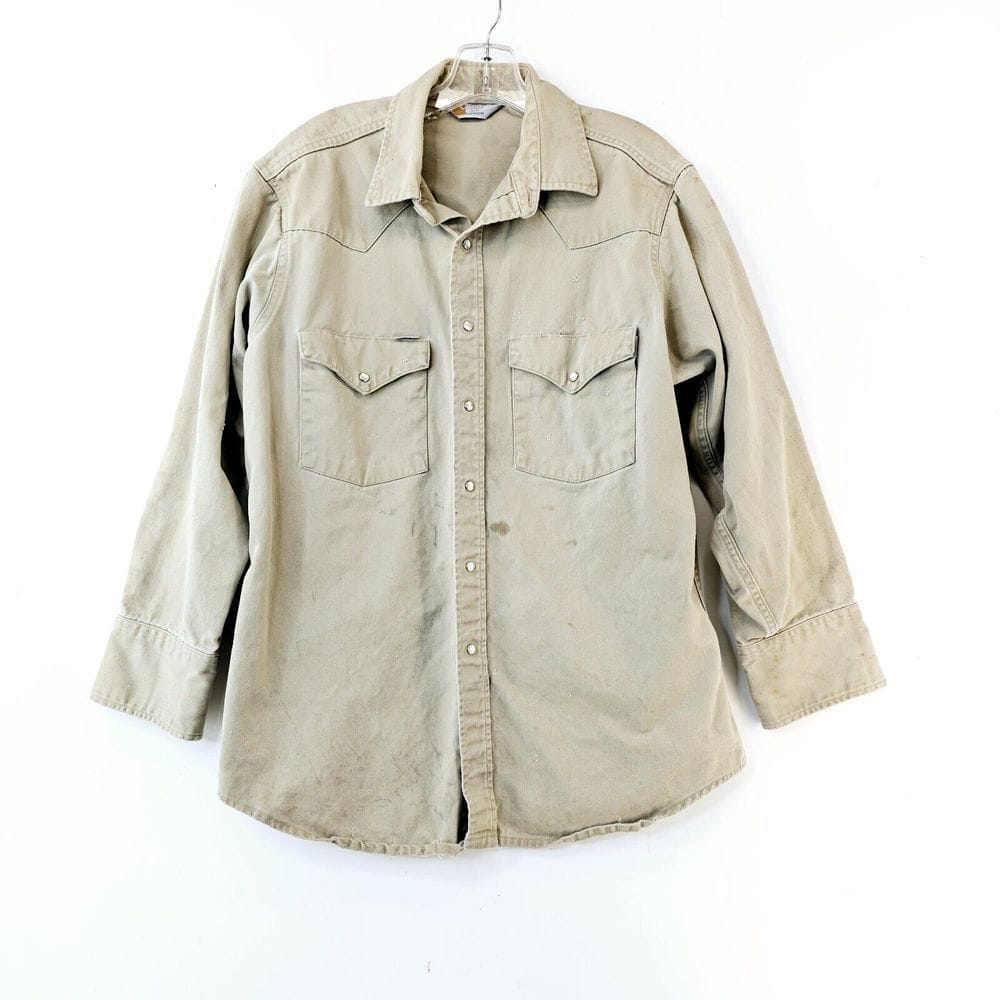 Carhartt heavyweight khaki work shirt with pearl snap buttons and rugged construction