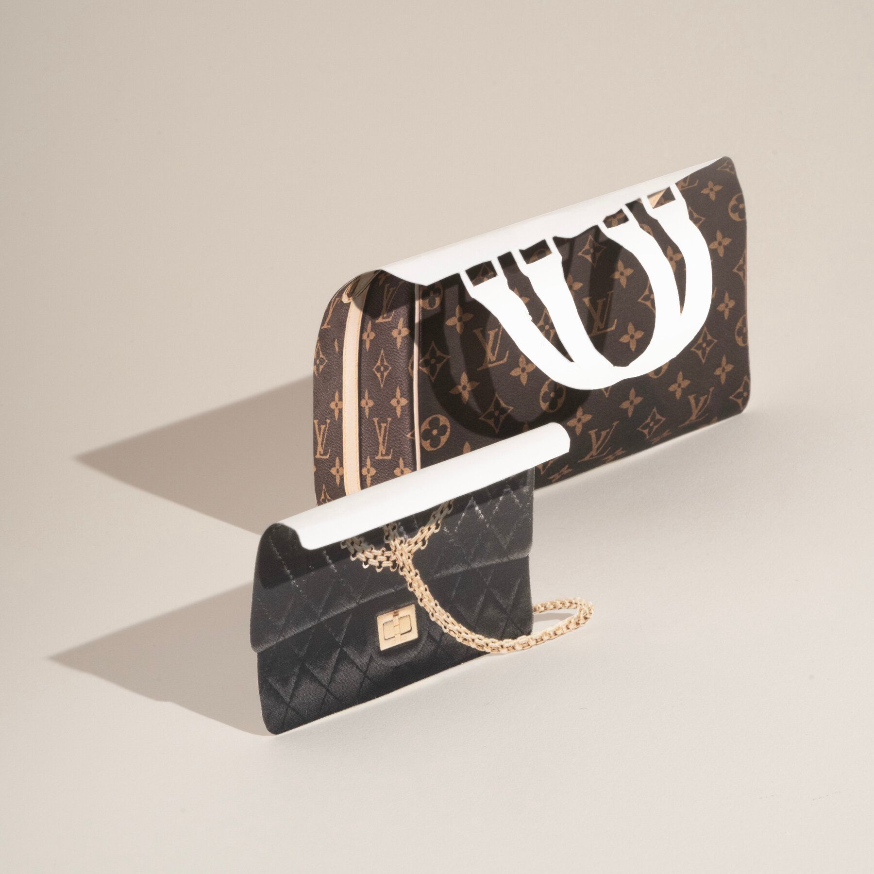 Louis Vuitton and Chanel luxury designer handbags for resale on secondary market