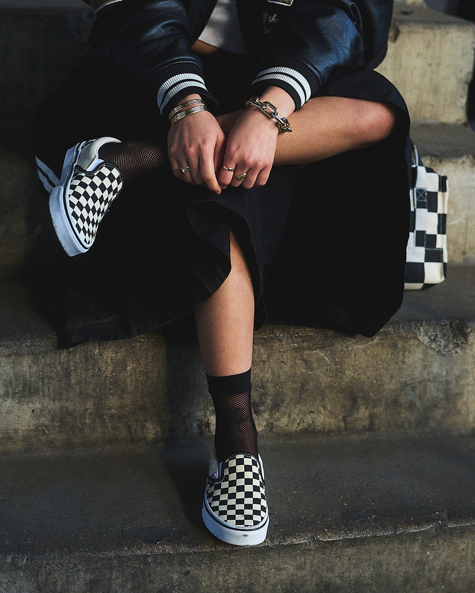 Vans classic checkerboard slip-on black and white iconic skate shoes on display