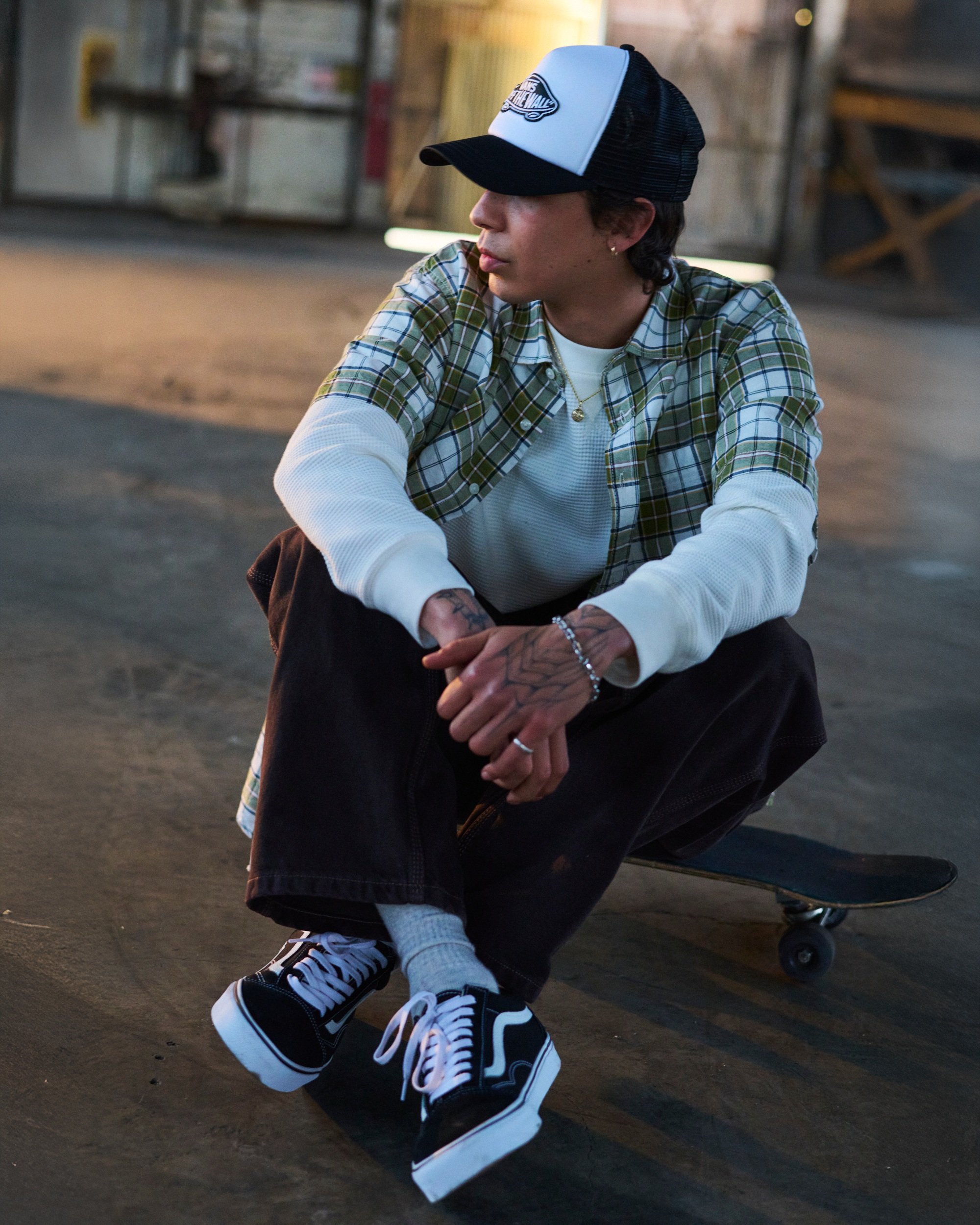 Vans Old Skool black and white classic skate sneaker with iconic side stripe design