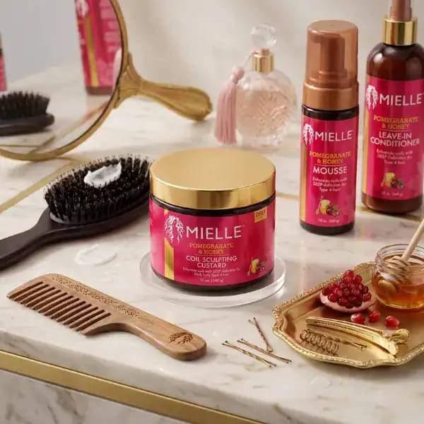 Mielle Organics Pomegranate and Honey Coil Sculpting Custard jar for Type 4 curly hair
