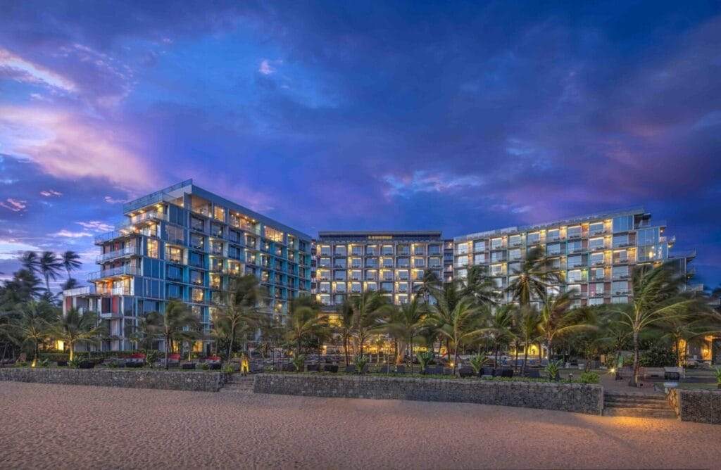 Radisson Blu Resort Galle stylish pool area with palm trees and modern architecture in Sri Lanka