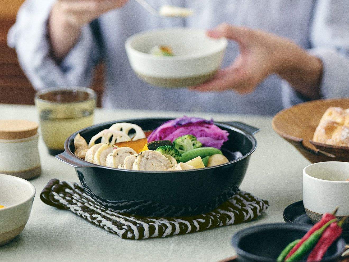 KINTO ceramic Japanese kitchenware collection on a minimalist dining table setting